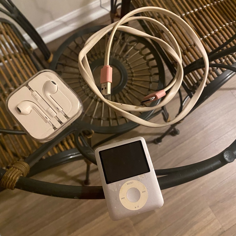 Apple iPod Nano with White Earbuds and charging Cable
